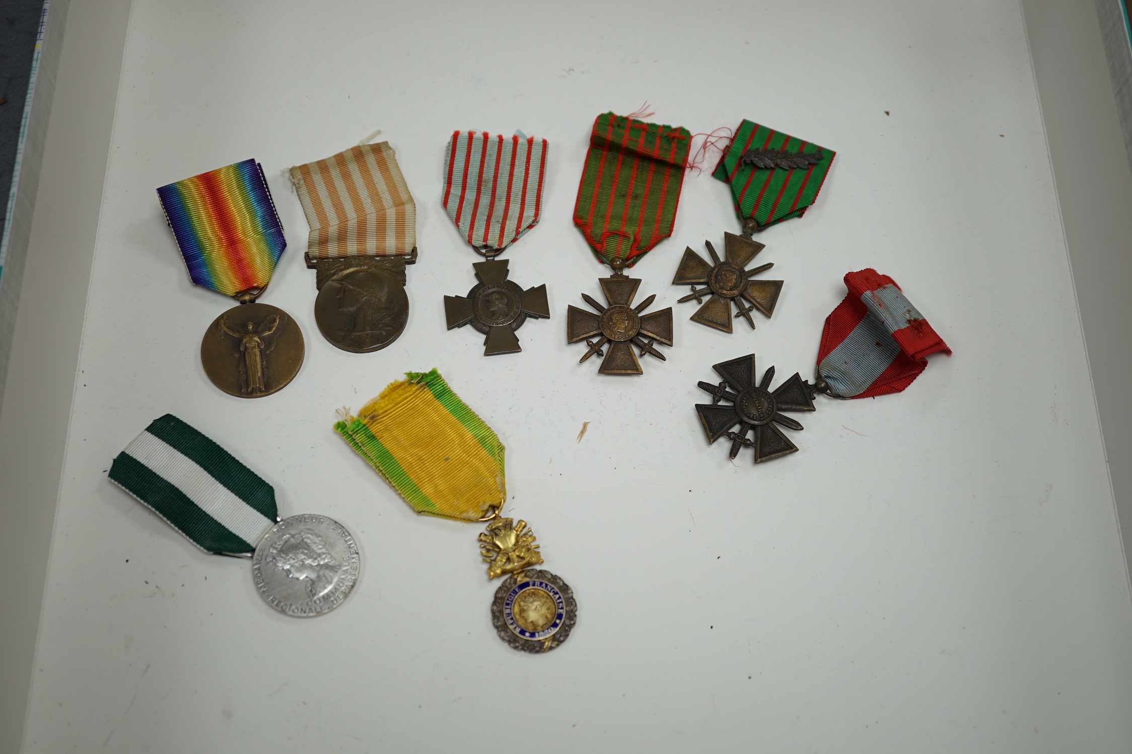 Eighteen French medals, including The War Cross, TOE French Legion Cross, Medal of Honour, Croix du Combatant Medal, WWI Commemorative Medal, 1870 Military Medal, 1914-18 Victory Medal, etc.